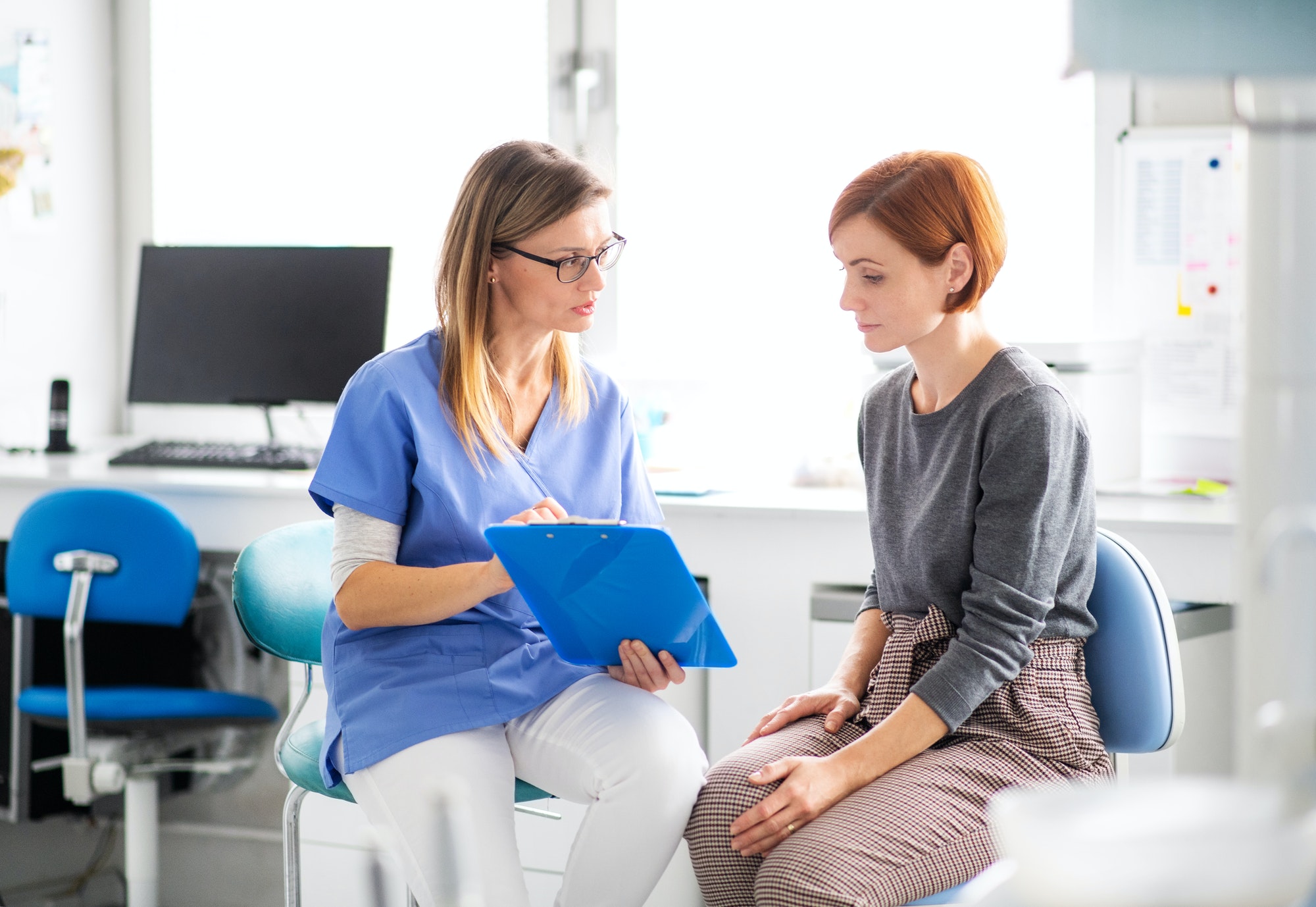a-dentist-talking-to-woman-in-dentist-surgery-a-dental-check-up.jpg a-dentist-talking-to-woman-in-dentist-surgery-a-dental-check-up.jpg